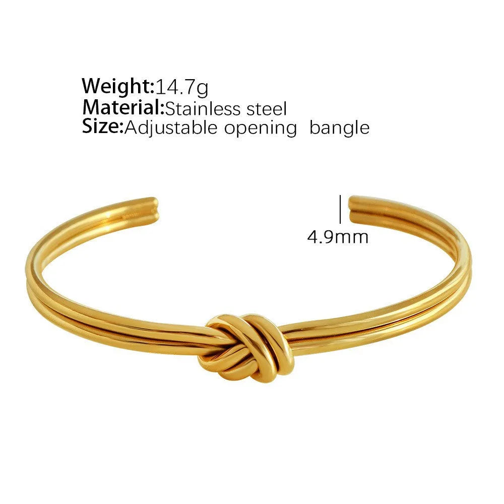 Adjustable knotted C-shaped double-layer bracelet in stainless steel with gold plating