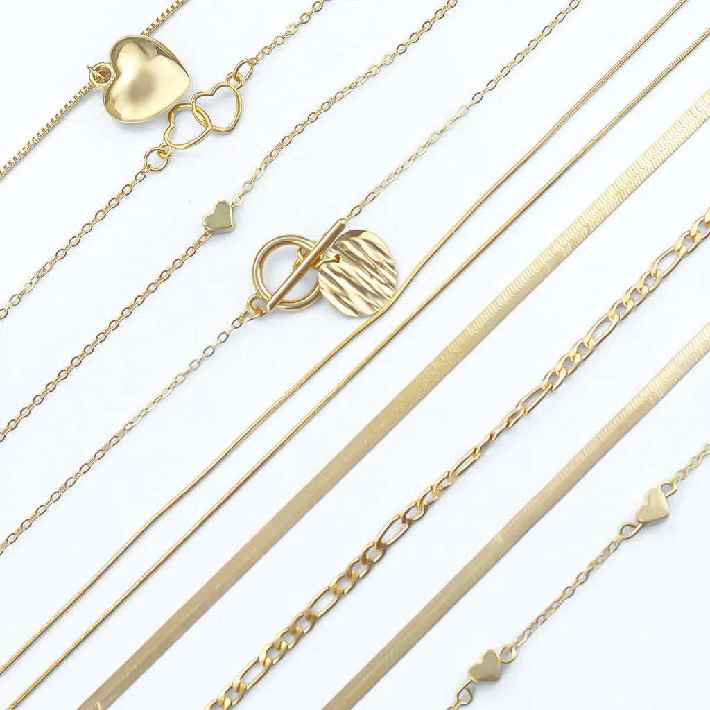 10-piece gold electroplated women's necklace set with adjustable snake chain from 21cm to 50cm length