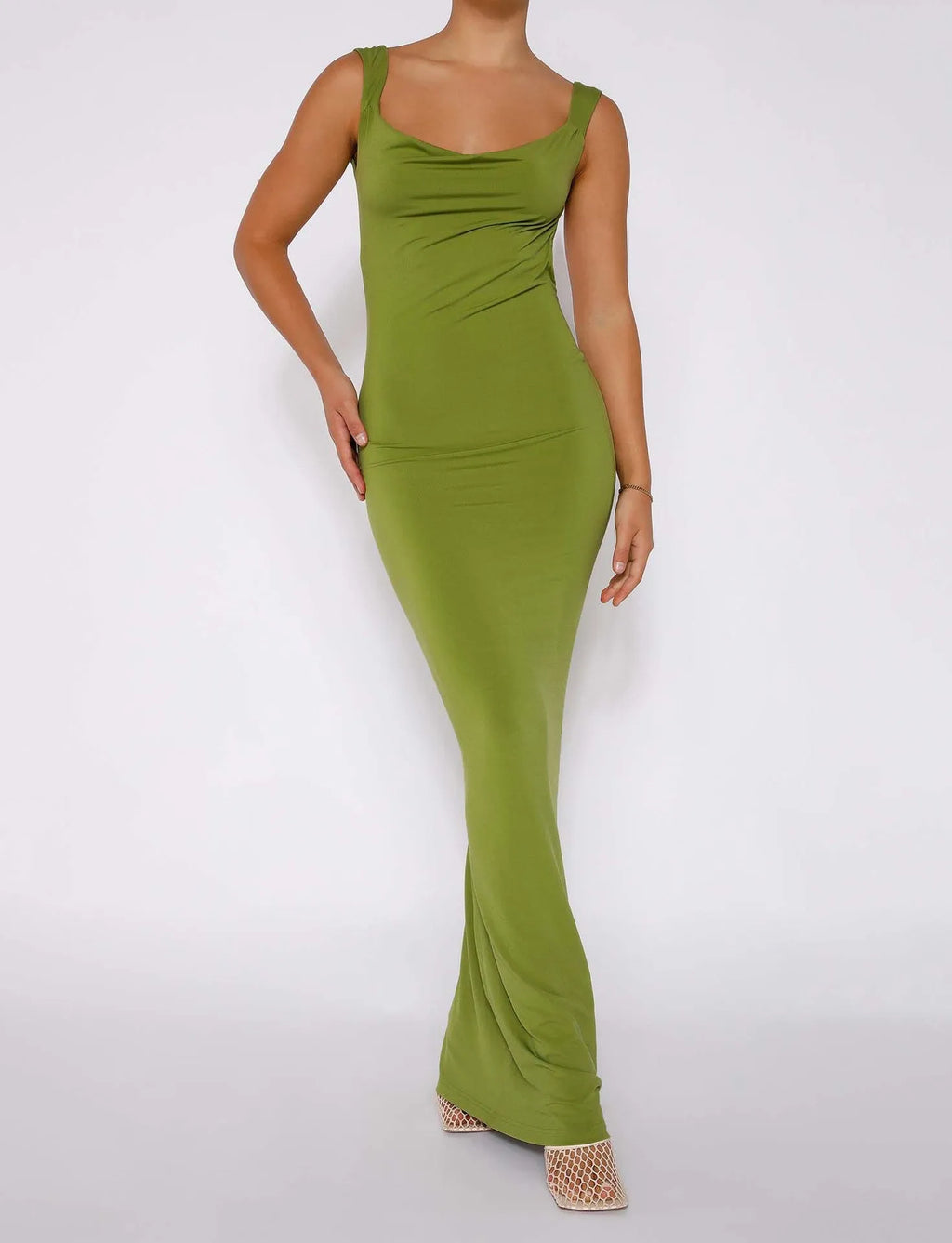 Backless slim-fit Milk Silk sling dress with spaghetti straps and a long hip skirt in Champagne colour.