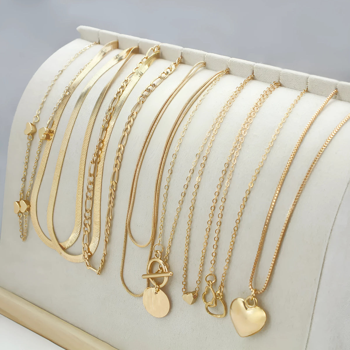 10-piece gold electroplated women's necklace set with adjustable snake chain from 21cm to 50cm length