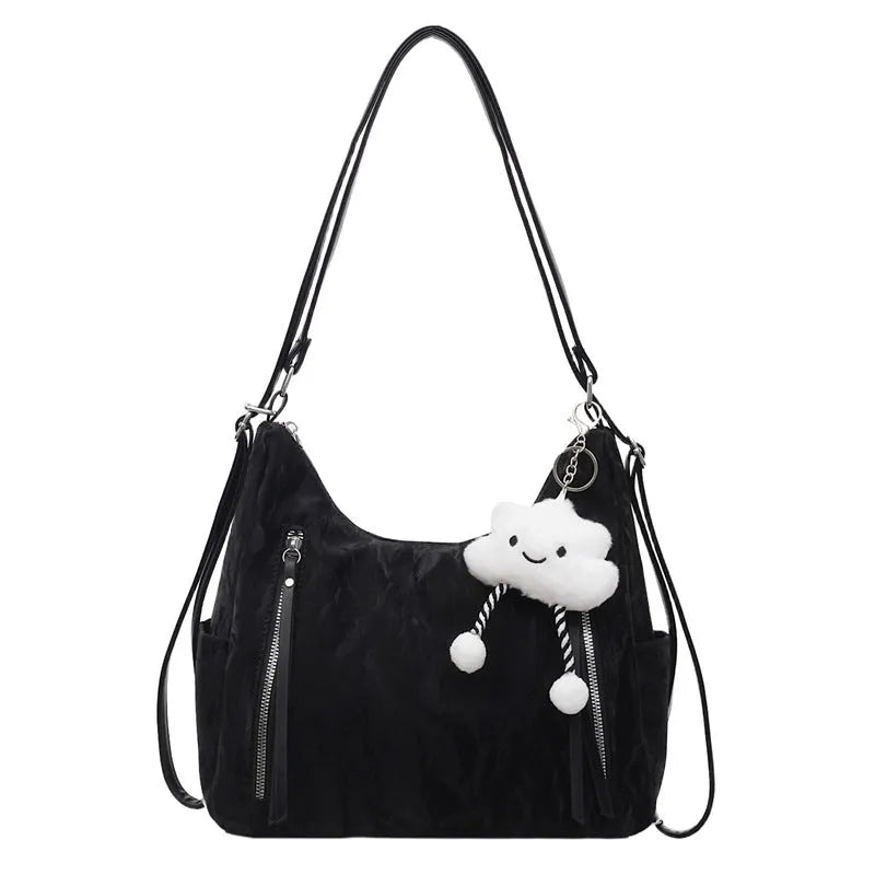 Women's soft PU fashion backpack in four colour options with pendant accessory