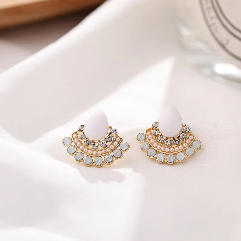 Women's silver geometric fan-shaped earrings with rhinestone and opal decorative details