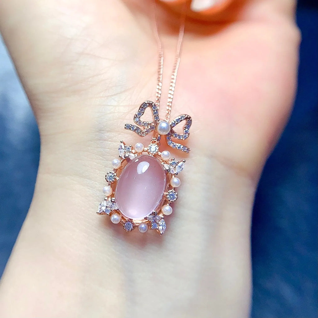 Geometric rose quartz pendant necklace with rose gold plated silver mounting on alloy chain