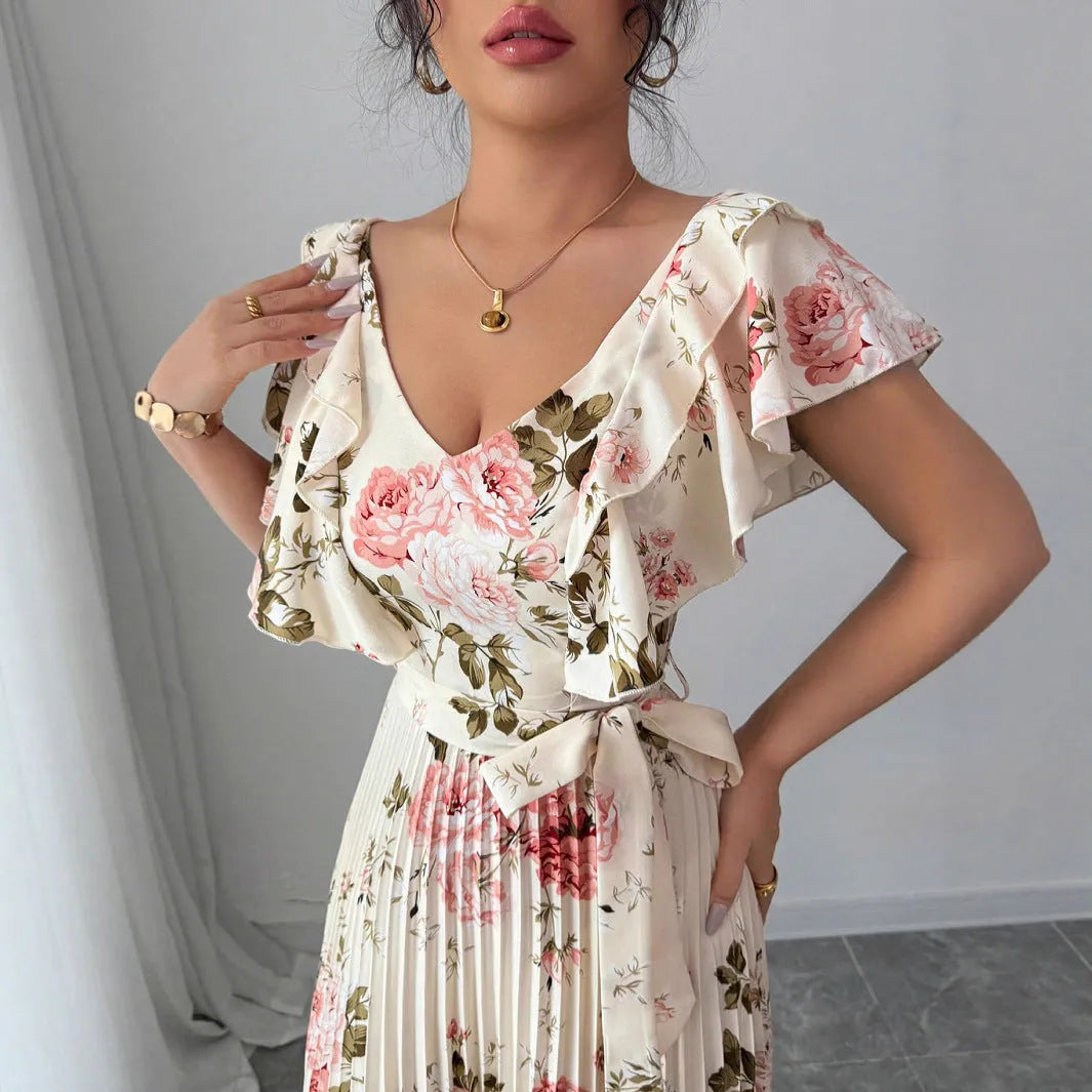 Apricot floral print dress with V-neck, ruffled short sleeves, and oversized swing skirt