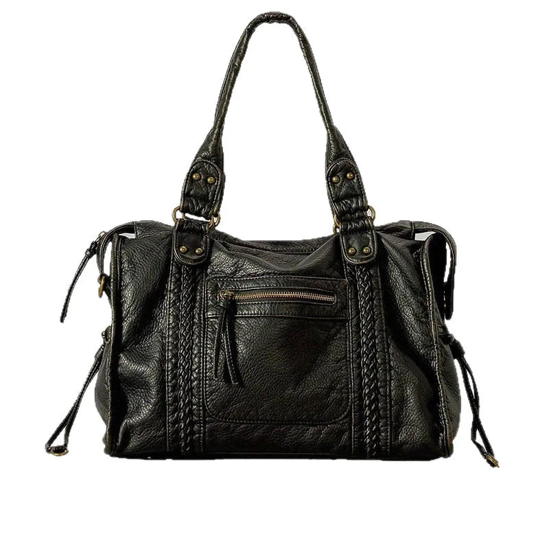 Women's retro motorcycle messenger shoulder bag in brown with woven detail accents and horizontal square shape