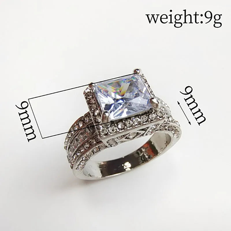 Geometric women's fashion ring with electroplated metallic finish in gold or white colour options