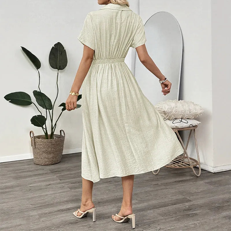 Light green women's shirt dress with lapel collar, waist tie, and side pockets