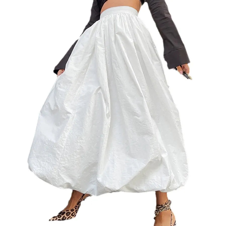 Women's cotton long skirt in solid black colour with elastic waistband and long length design