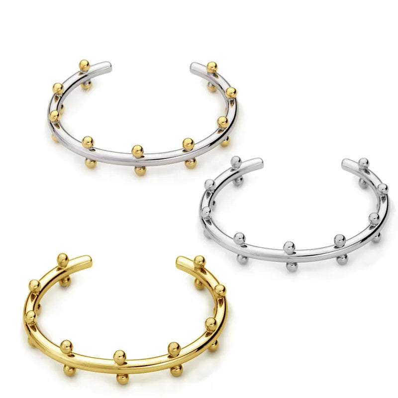 Stainless steel C-shaped bracelet with rivet bean bead texture in gold, steel, or steel gold colour
