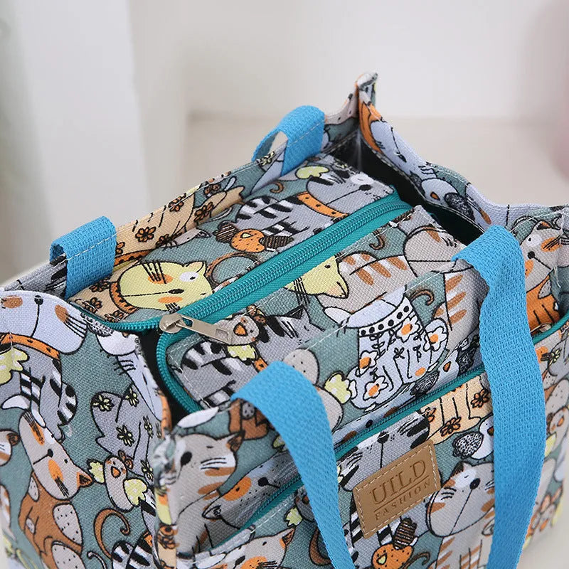 Women's printed canvas tote bag with aluminium frame in multiple design options