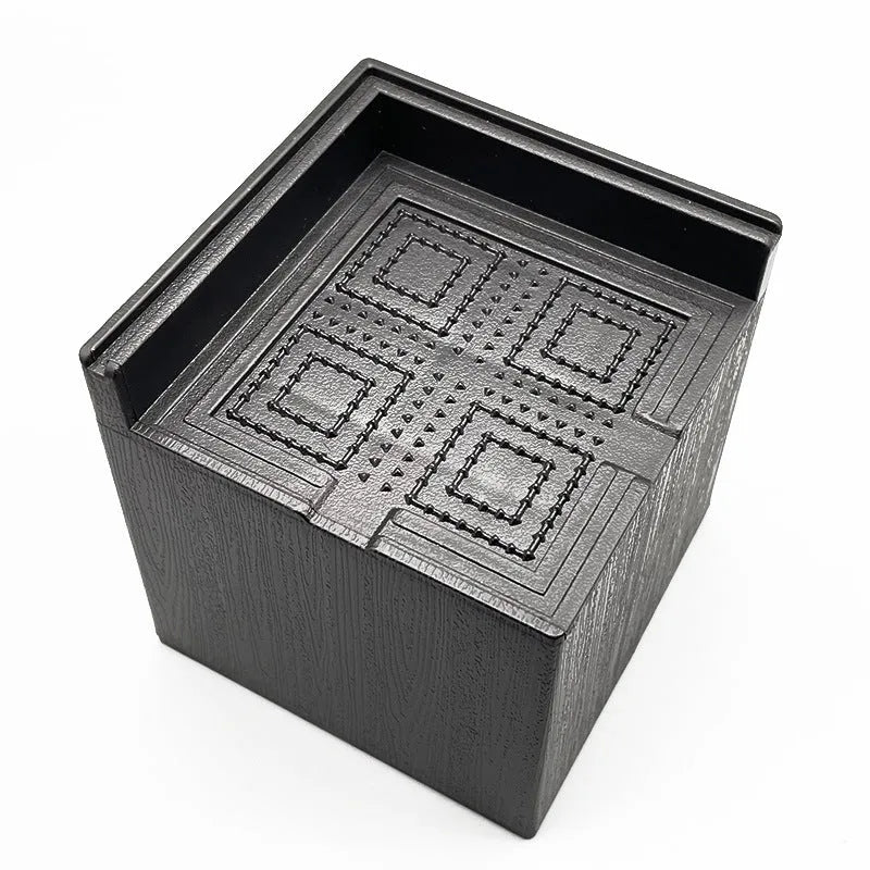 Four black plastic furniture riser mats for increasing bed and sofa height