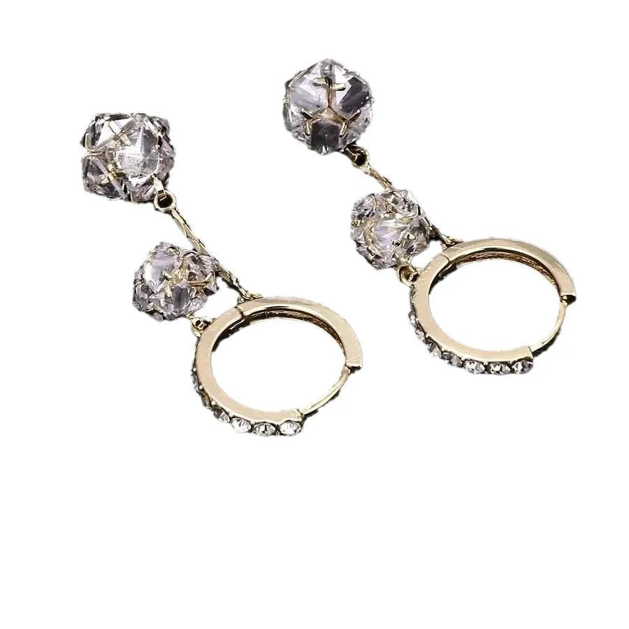 Silver women's earrings with balloon and rhinestone pendants in drop shape design.