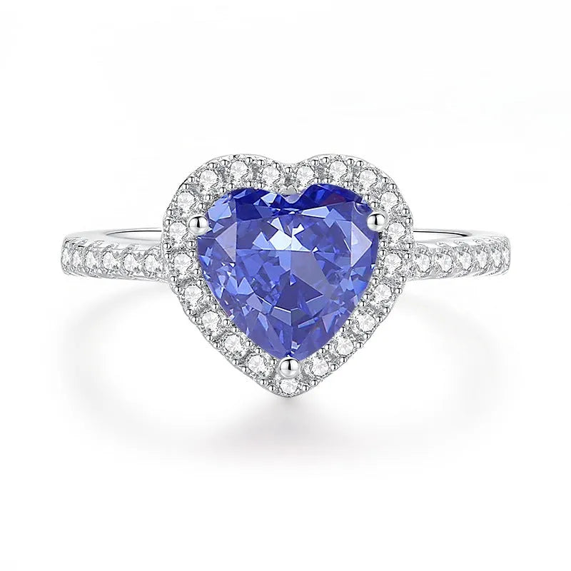 Heart-shaped sterling silver ring with a faceted ice flower cut zircon stone in a tan sang colour.