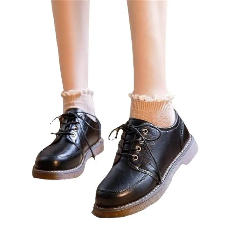 Women's preppy retro mary jane shoes in black with front lace-up design and low square heel