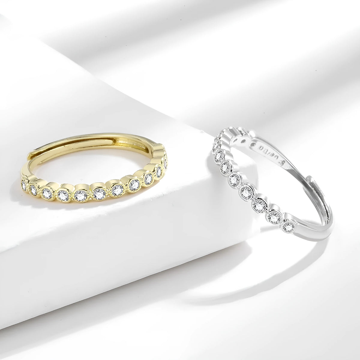 Women's geometric diamond tail ring with open mouth design in electroplated white gold or yellow gold colour