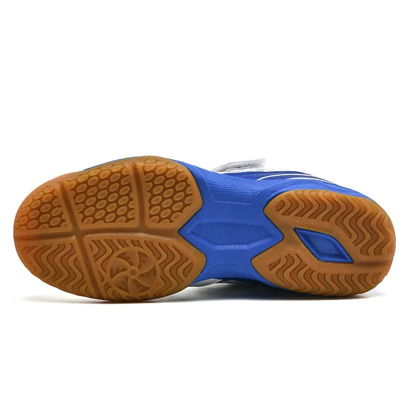 White and blue casual badminton shoes with ribbed sole and breathable PVC upper.