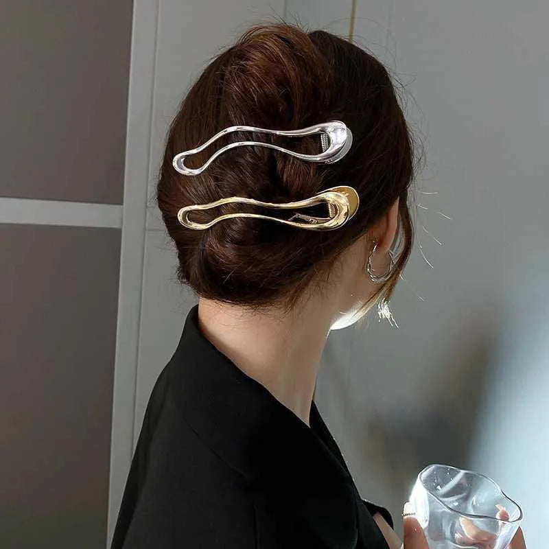 Golden and silver zinc alloy barrettes in square, arc and triangle designs for women's hair