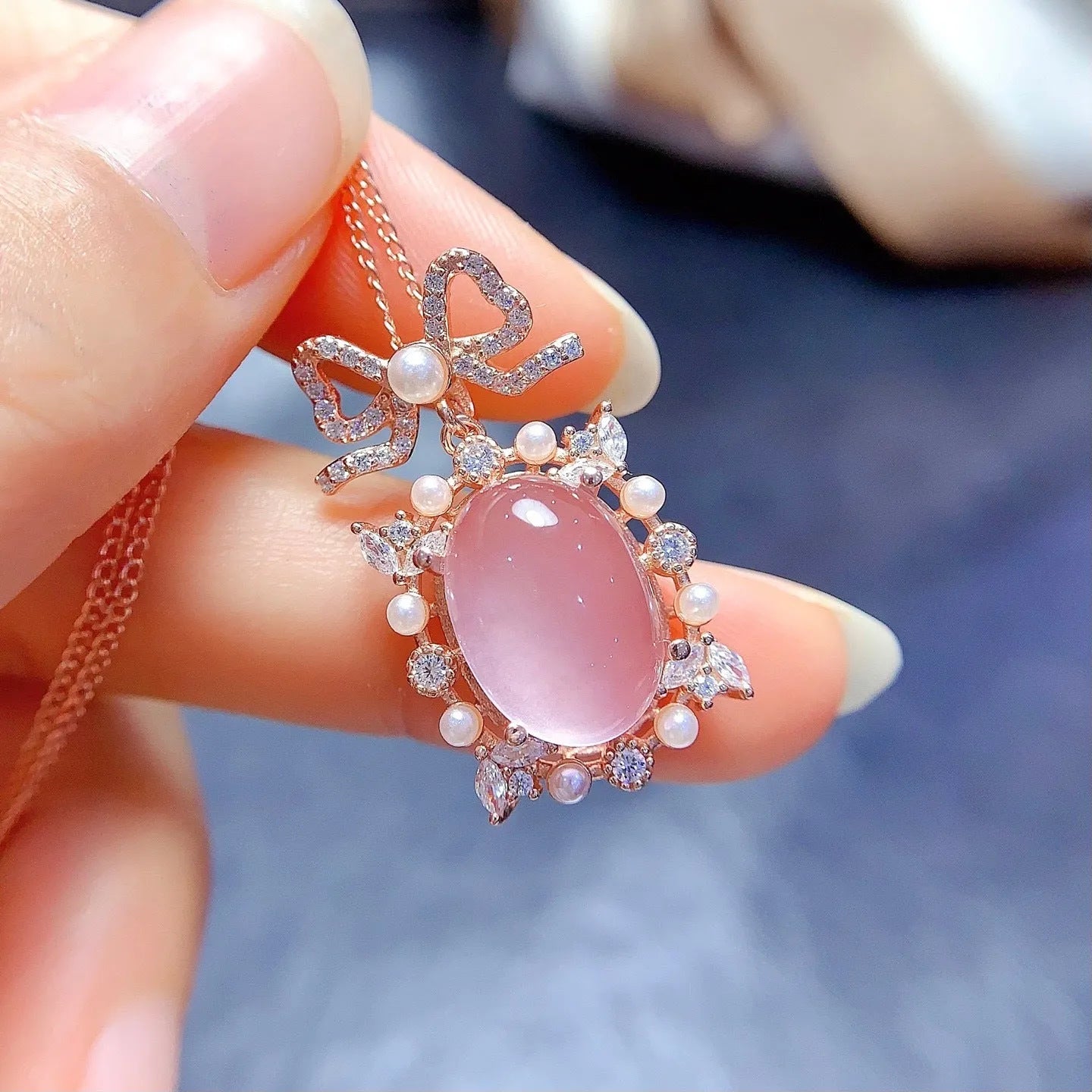 Geometric rose quartz pendant necklace with rose gold plated silver mounting on alloy chain