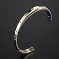 Open-ended stainless steel bracelet with zircon stones in rose, steel or gold colour options