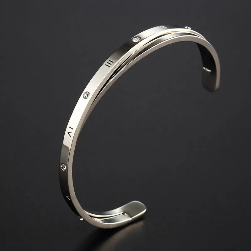Open-ended stainless steel bracelet with zircon stones in rose, steel or gold colour options