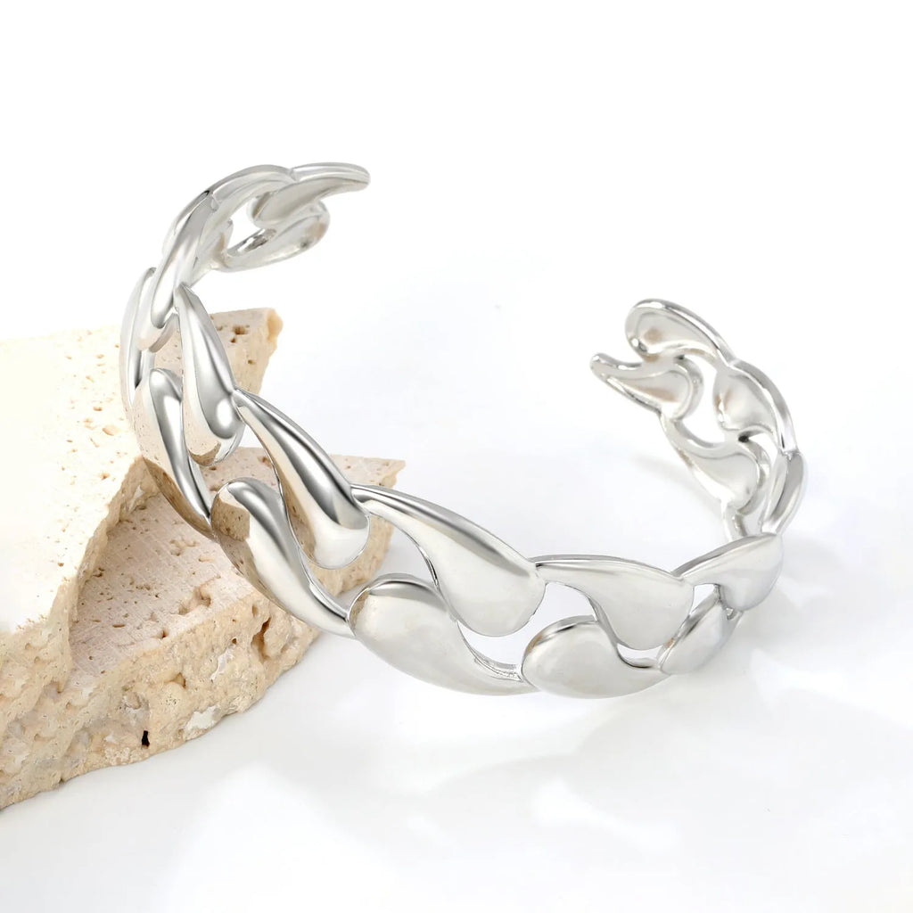 Stainless steel alloy bracelet in advanced European American trend style on wrist.