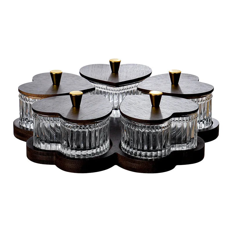 Glass retro-style serving platter with heart-shaped transparent lid and multiple food compartments.