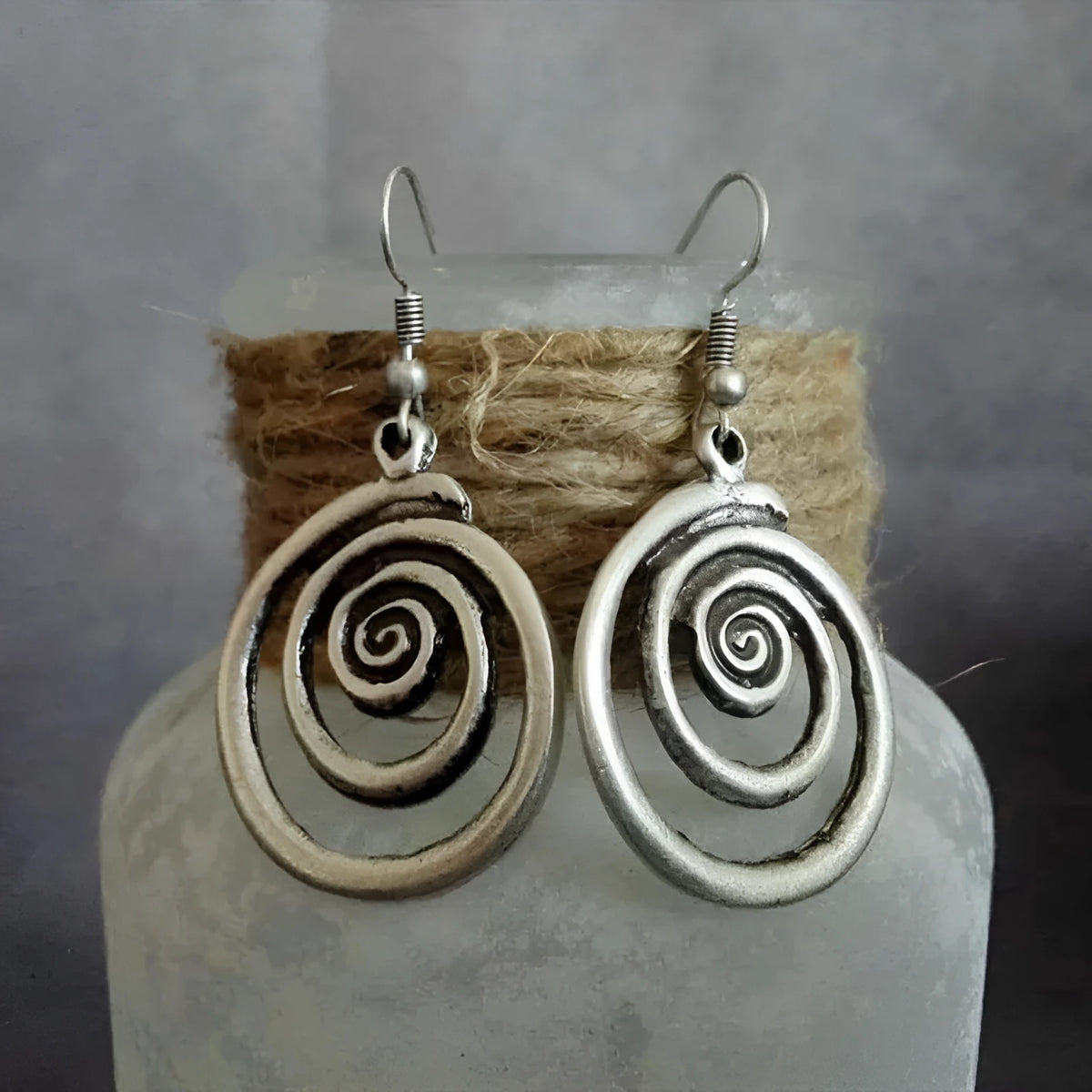 Silver geometric spiral distressed alloy earrings measuring 2.6×5cm