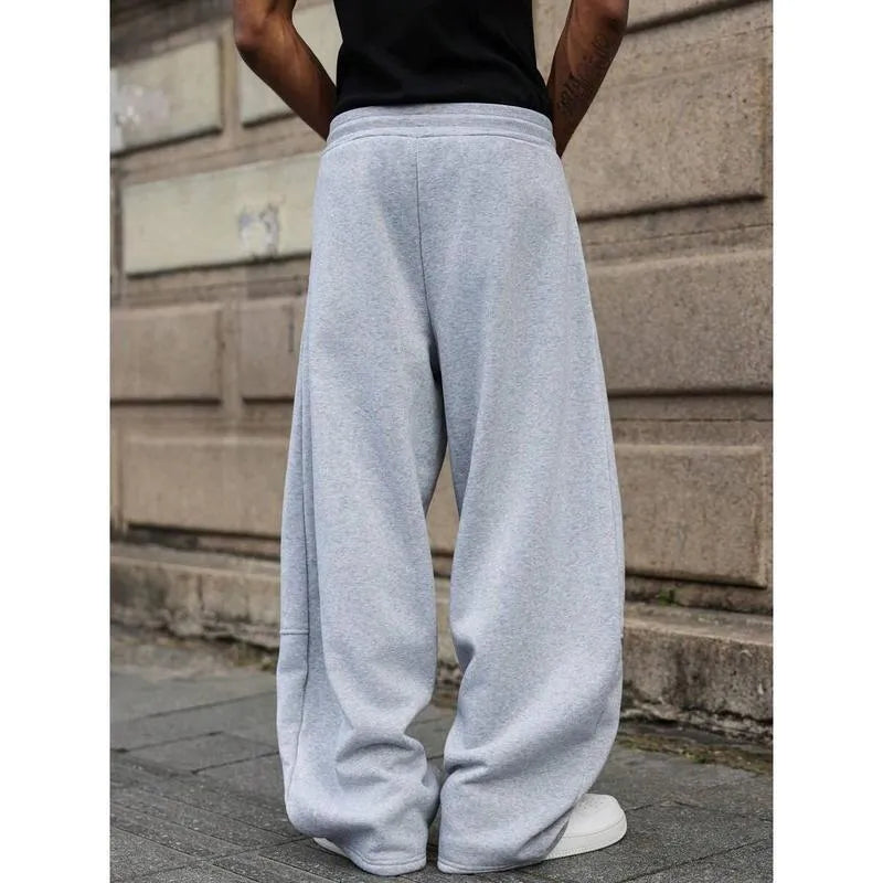 Men's straight high waist casual pants in bamboo fibre blend fabric showing elastic fit and cropped length