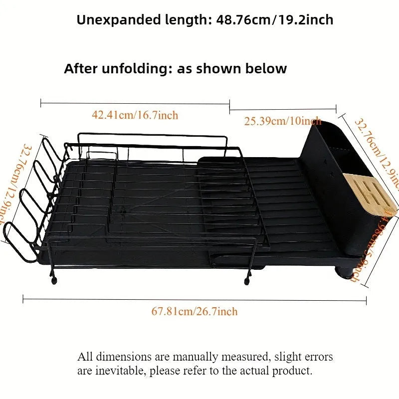 Foldable carbon steel kitchen drain rack for cutlery, knives, forks, spoons, and cups on a worktop.