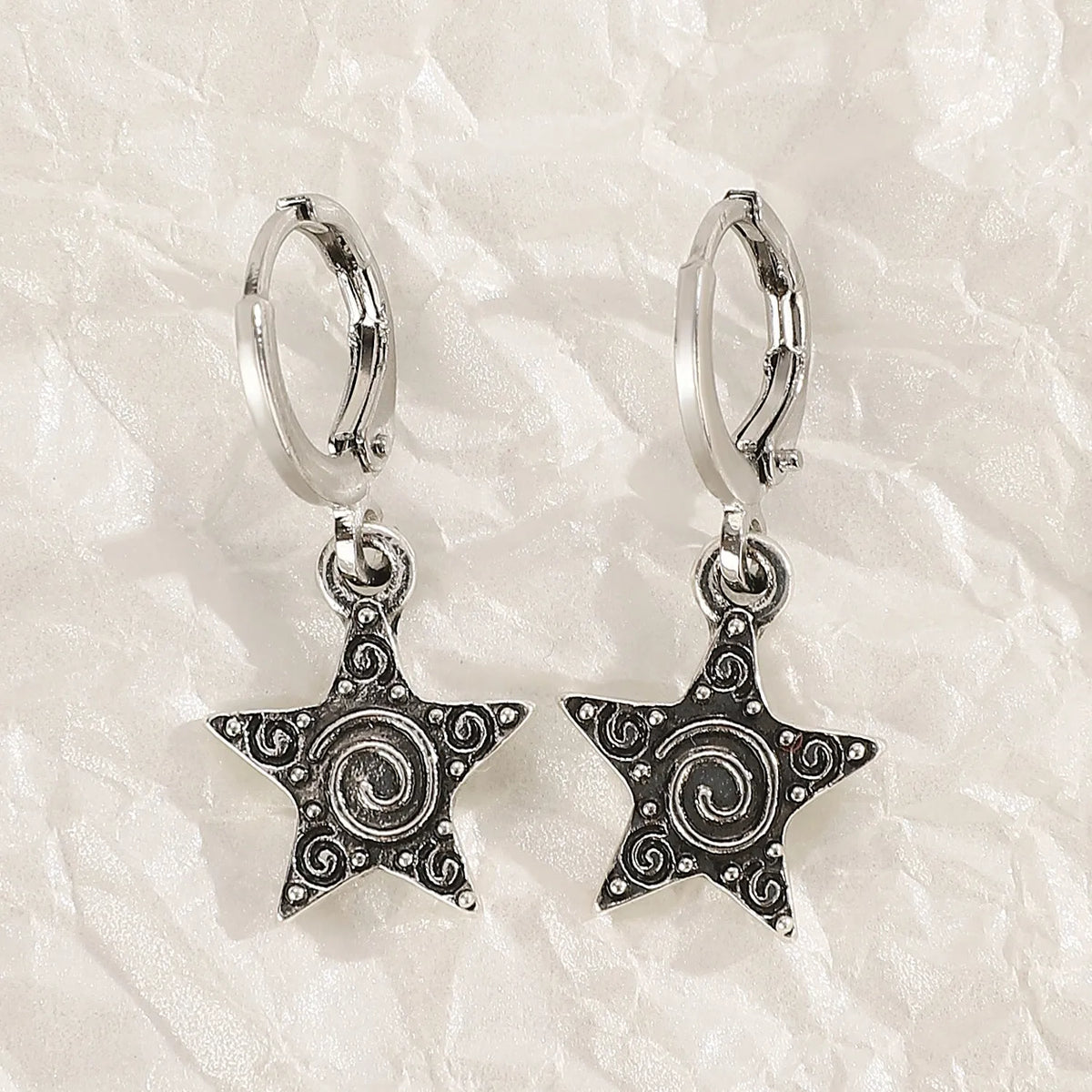 Women's alloy earrings with cross, heart, animal, and zodiac designs in white, black cat, and antique silver finishes