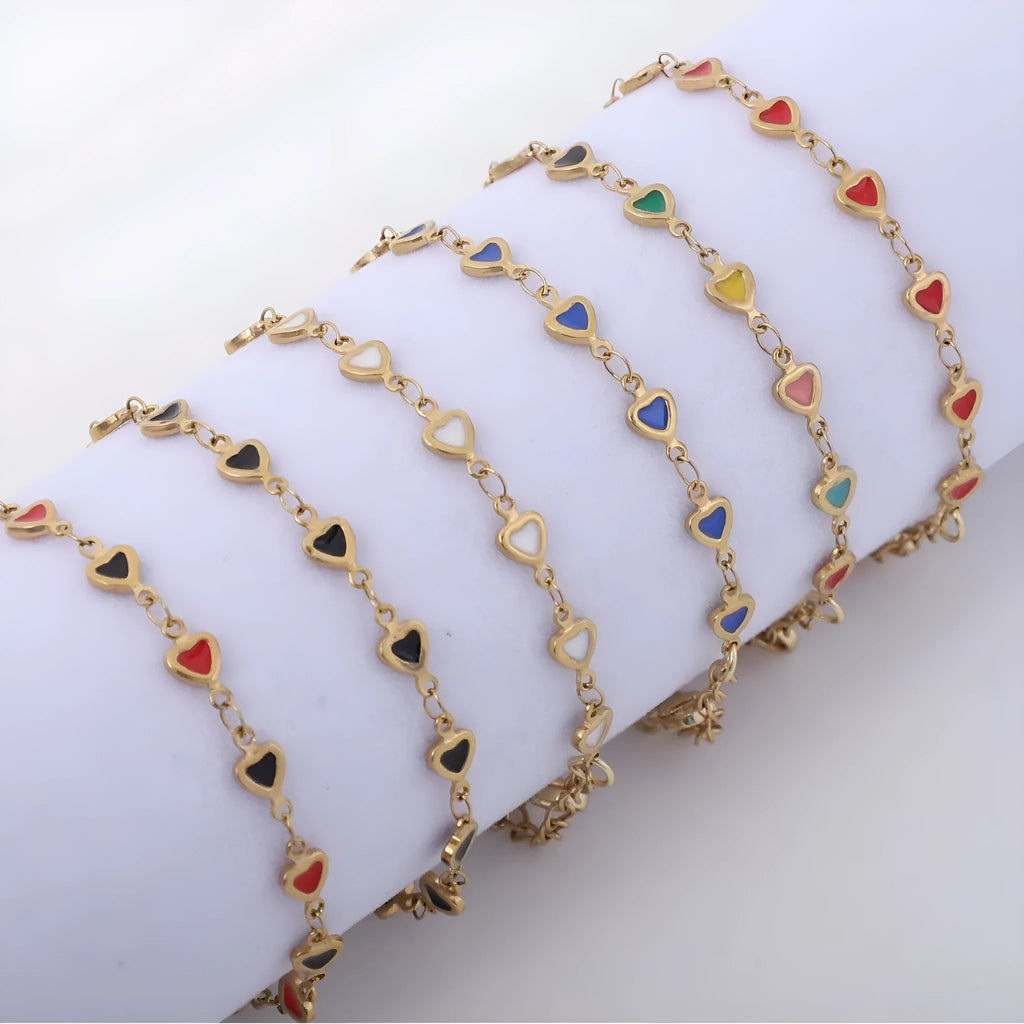 Heart-shaped stainless steel bracelet with gold plating in various colour options.