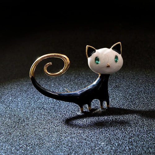 Alloy cat brooch with painted tail detail in white or orange colour for women's decorative fashion accessory