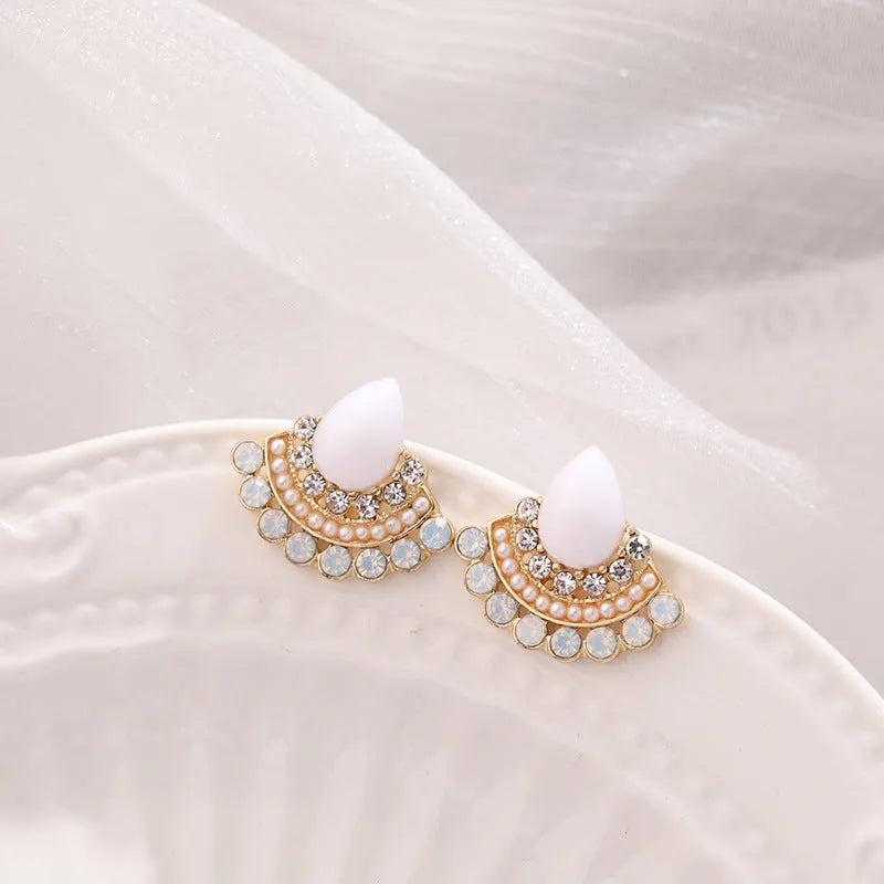 Women's silver geometric fan-shaped earrings with rhinestone and opal decorative details