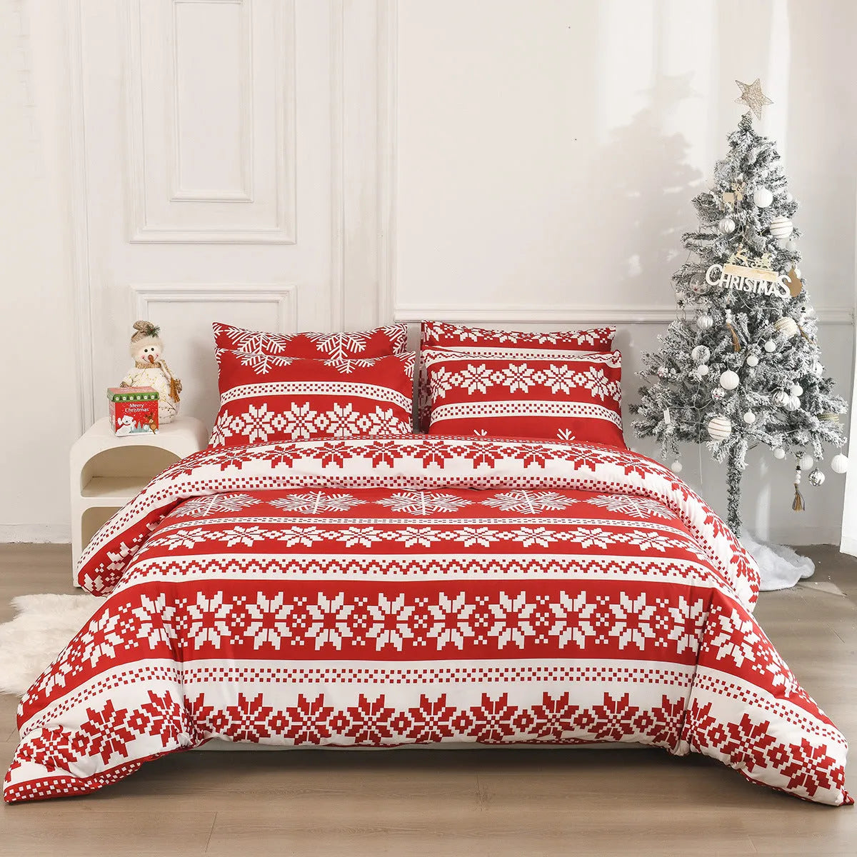 Red Christmas pattern bedding three-piece set with quilt cover and pillowcases on bed