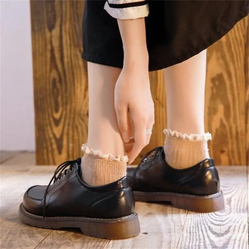 Women's preppy retro mary jane shoes in black with front lace-up design and low square heel