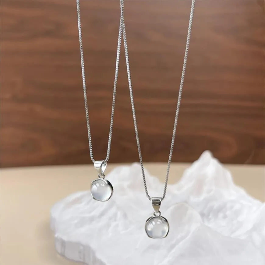 Korean-style women's oval pendant necklace with artificial crystal star on an adjustable box chain.
