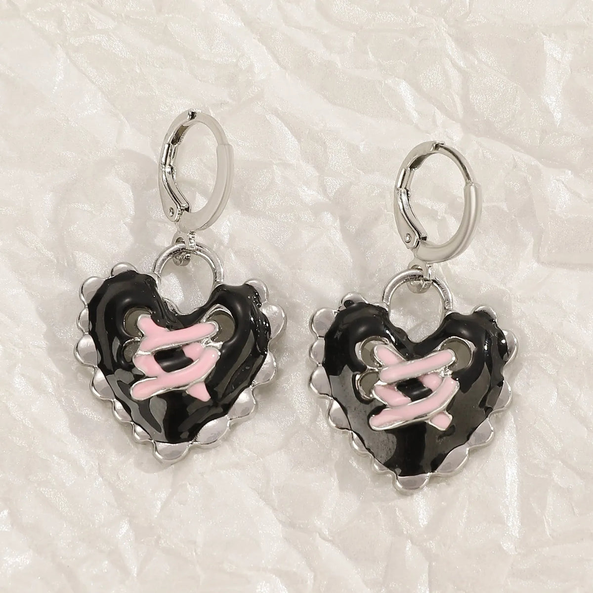 Women's alloy earrings with cross, heart, animal, and zodiac designs in white, black cat, and antique silver finishes