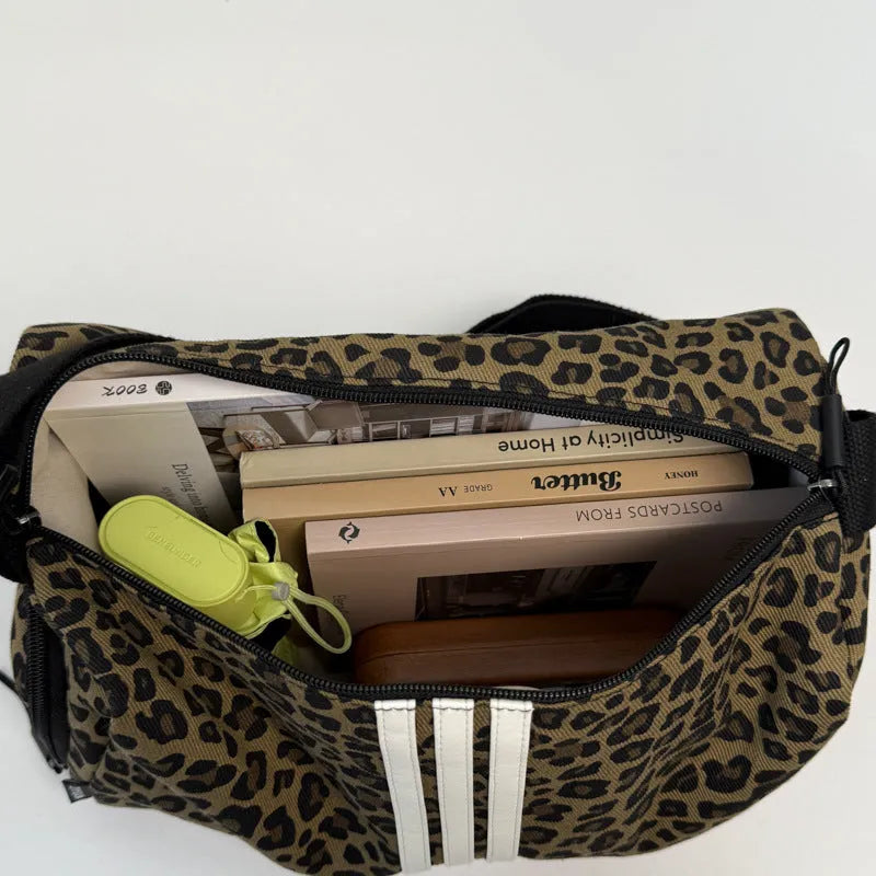 Leopard print sports style shoulder messenger bag with cross-body strap and large capacity design