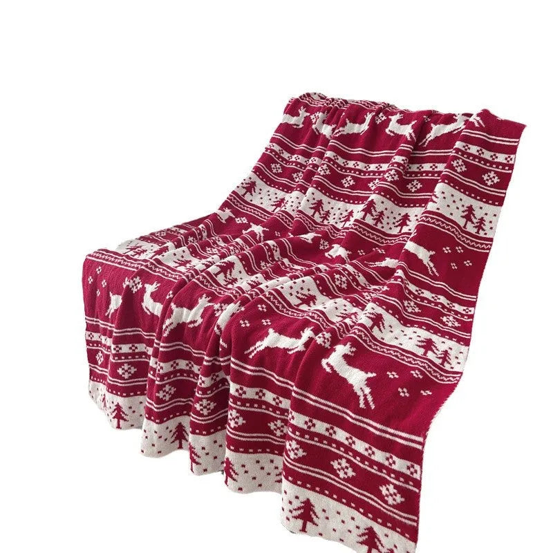 Christmas patterned acrylic blanket in snowflake or reindeer design showing casual style for home decoration