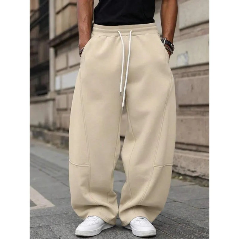 Men's straight high waist casual pants in bamboo fibre blend fabric showing elastic fit and cropped length