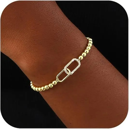 Adjustable stainless steel beaded bracelet for women in a simple geometric style with round beads.
