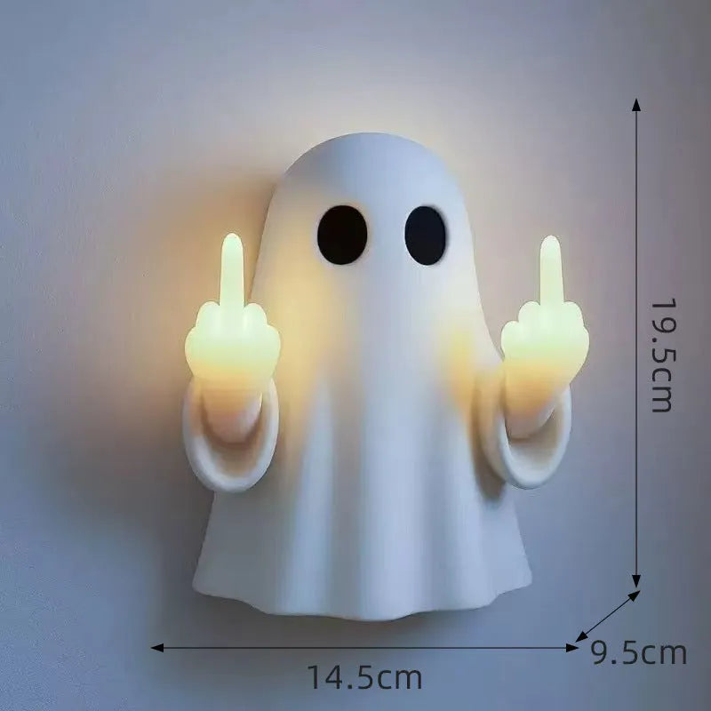 White modern ghost statue night lamp for Halloween decoration on a table