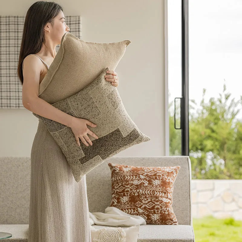 Solid colour pillow cushion on a sofa, showing 45x45cm square size with PP cotton filler.