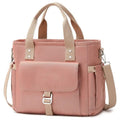 Cube-shaped Oxford cloth picnic bag with a removable shoulder strap and side pocket in pink.
