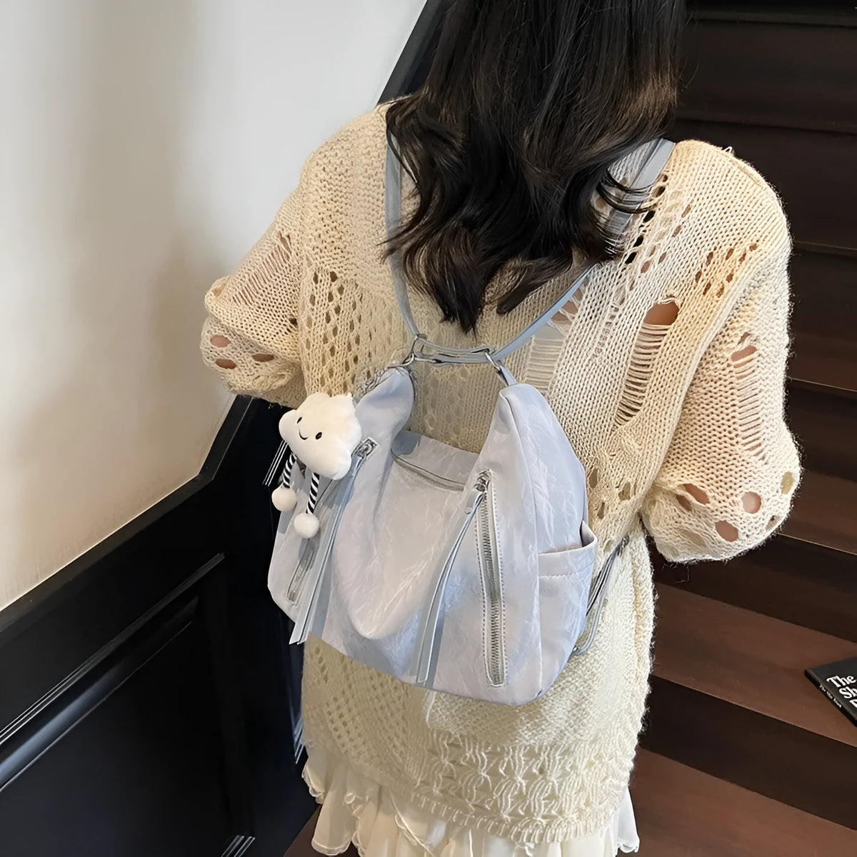 Women's soft PU fashion backpack in four colour options with pendant accessory