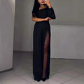 Black women's jumpsuit with an oblique off-shoulder neckline and a high slit on the leg.