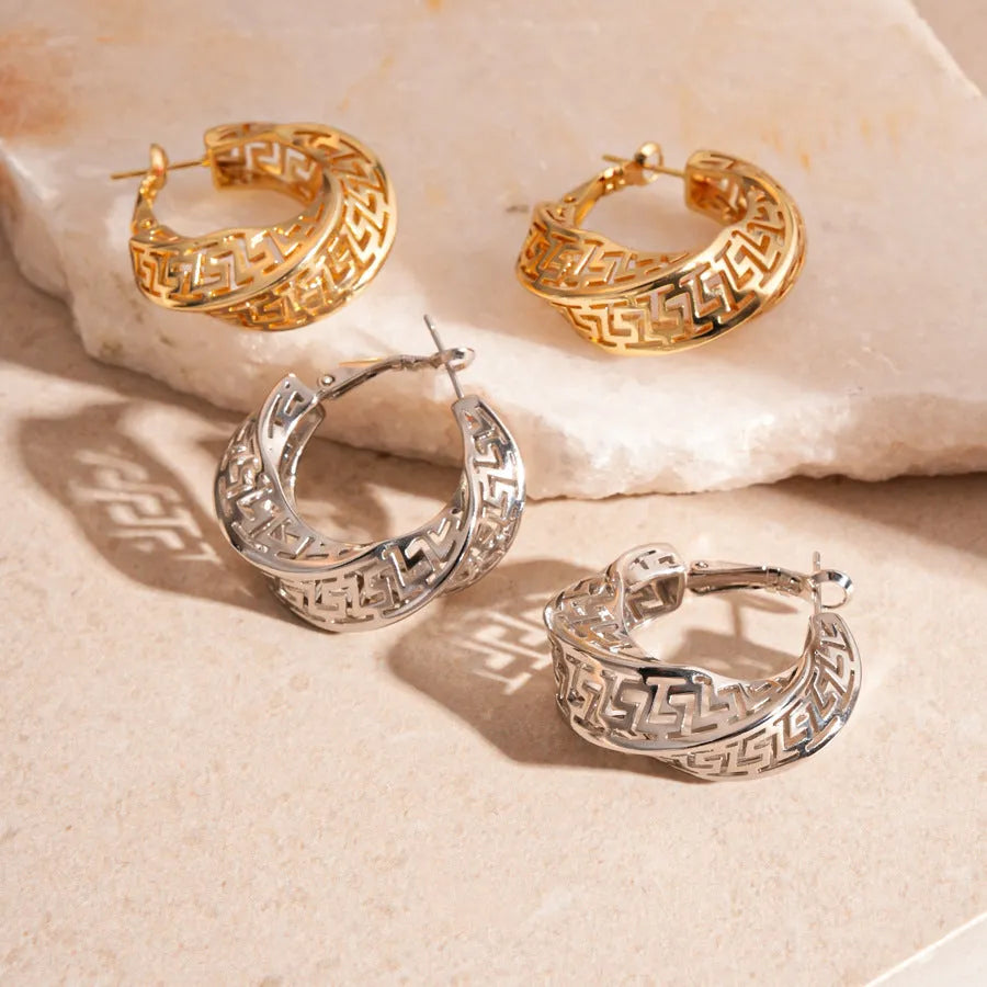 Geometric hollow stud earrings with twisted round design in gold electroplated finish