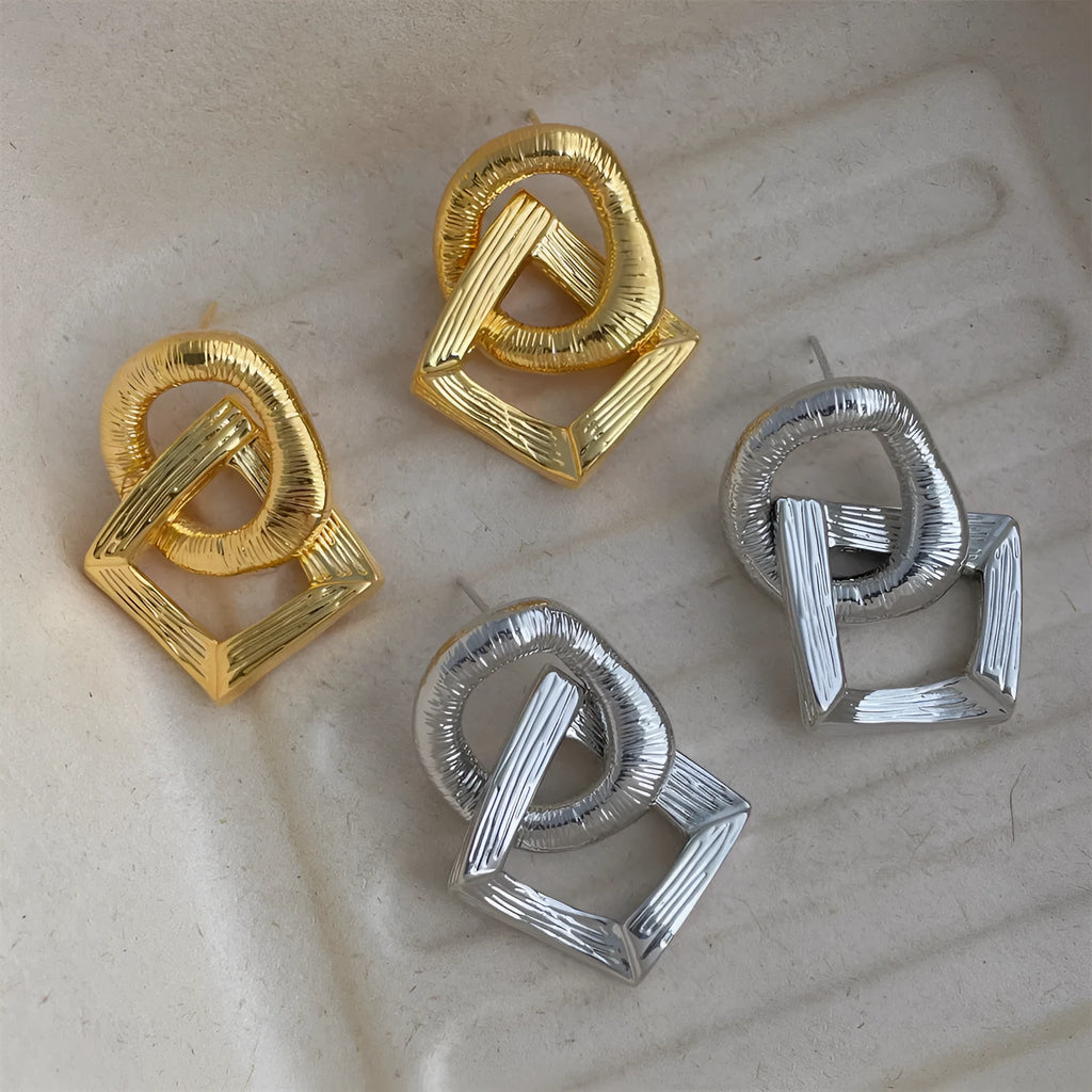 Geometric circle pendant earrings with 3.4cm drop in gold or silver electroplated finish