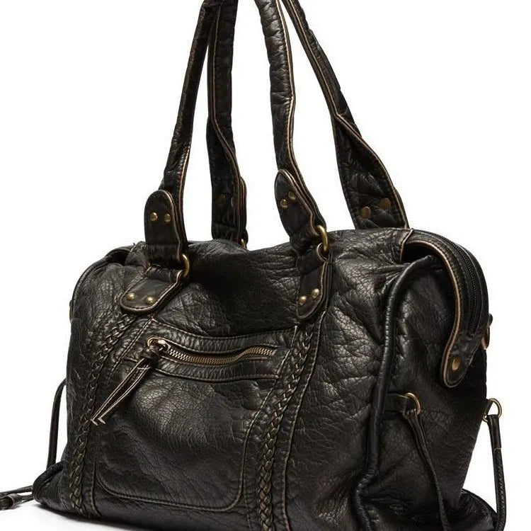 Women's retro motorcycle messenger shoulder bag in brown with woven detail accents and horizontal square shape