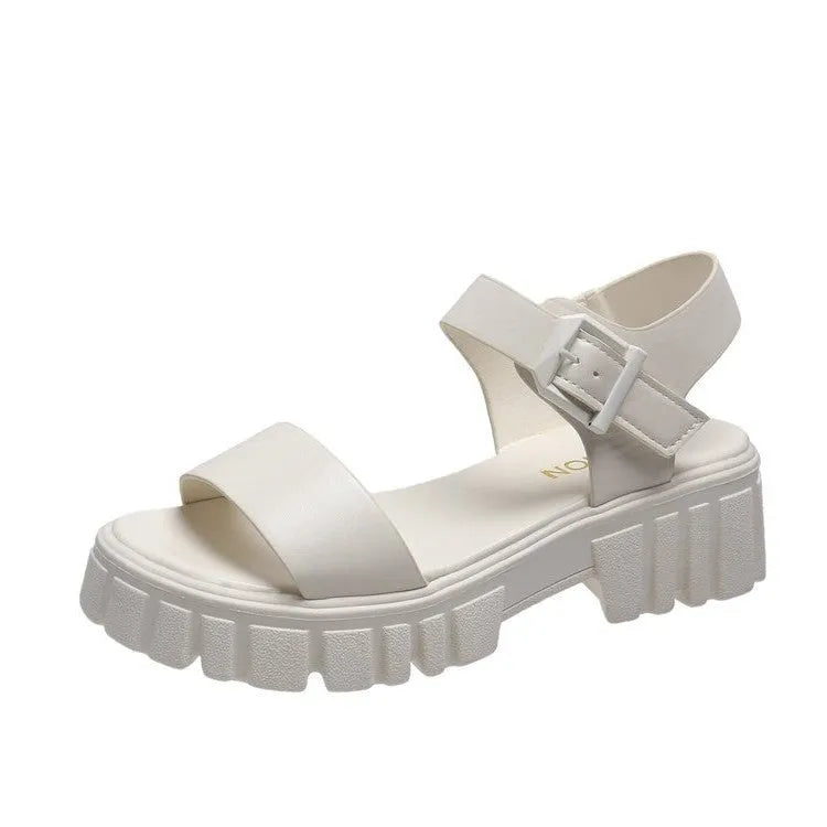Beige women's peep toe platform sandals with ankle-strap buckle on a neutral background.